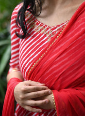 Celebrate tradition with this festive Anarkali suit.