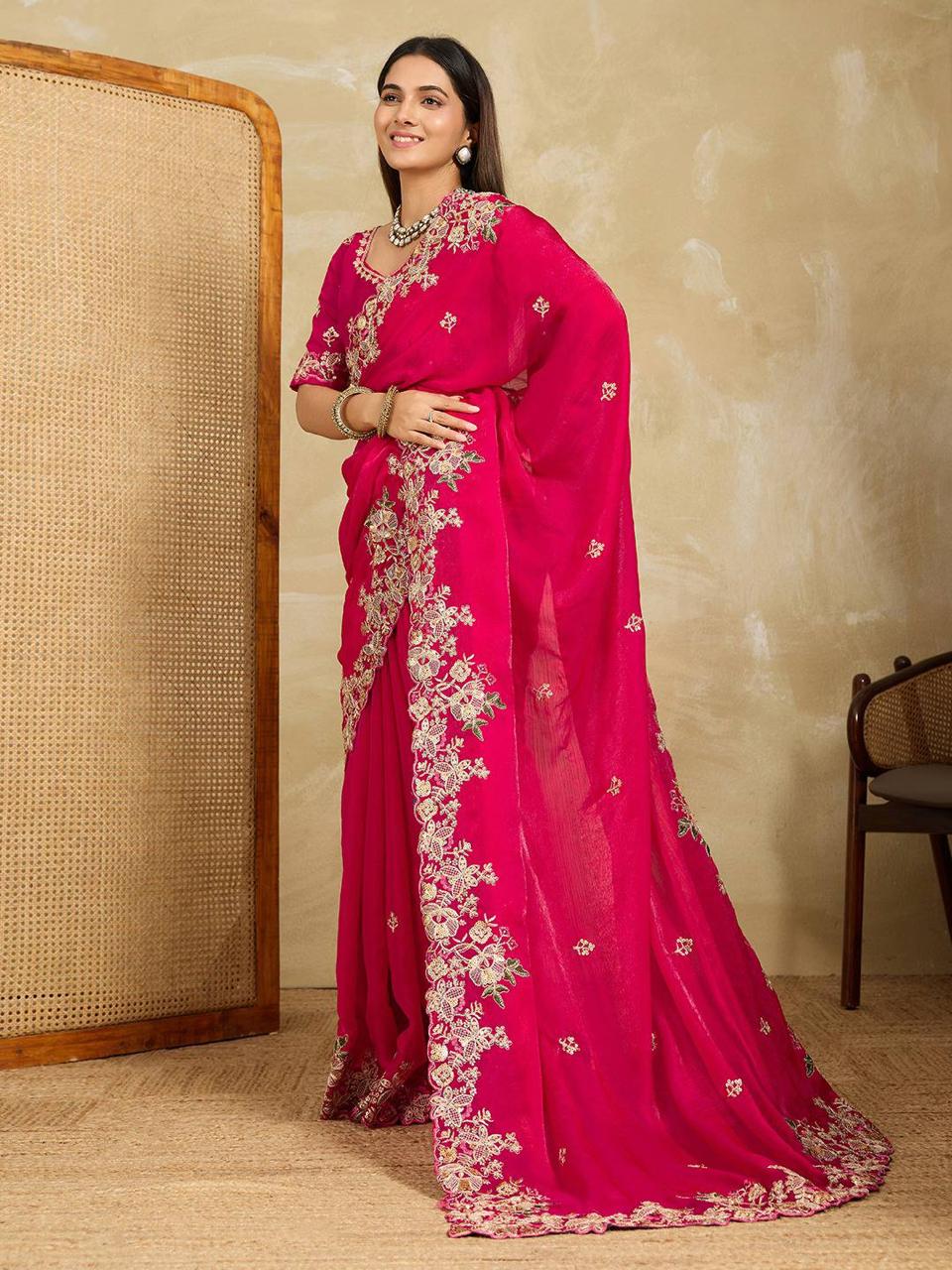 Saree for wedding in soft fendy chiffon with embroidery work and lace border, model showcasing elegant design.