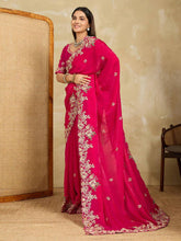 Saree for wedding in soft fendy chiffon with embroidery work and lace border, model showcasing elegant design.