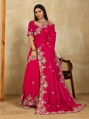 Saree for Wedding in Soft Fendy Chiffon featuring embroidery work and lace border, vibrant pink color, model wearing accessories.