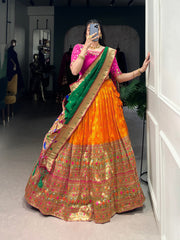 Orange Banarasi Silk Lehenga with Pink Blouse & Green Dupatta AllTreandy