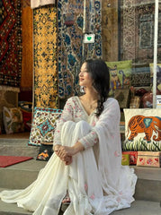 Glow in Grace: Ivory White Embroidered Flared Suit Set AllTreandy