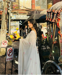 Glow in Grace: Ivory White Embroidered Flared Suit Set AllTreandy