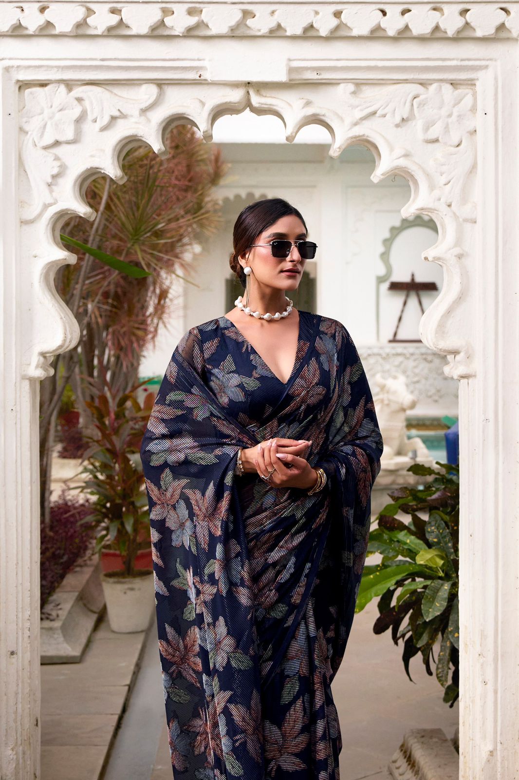 Navy Blue Faux Georgette Saree with Leaf Print & Stitched Blouse AllTreandy