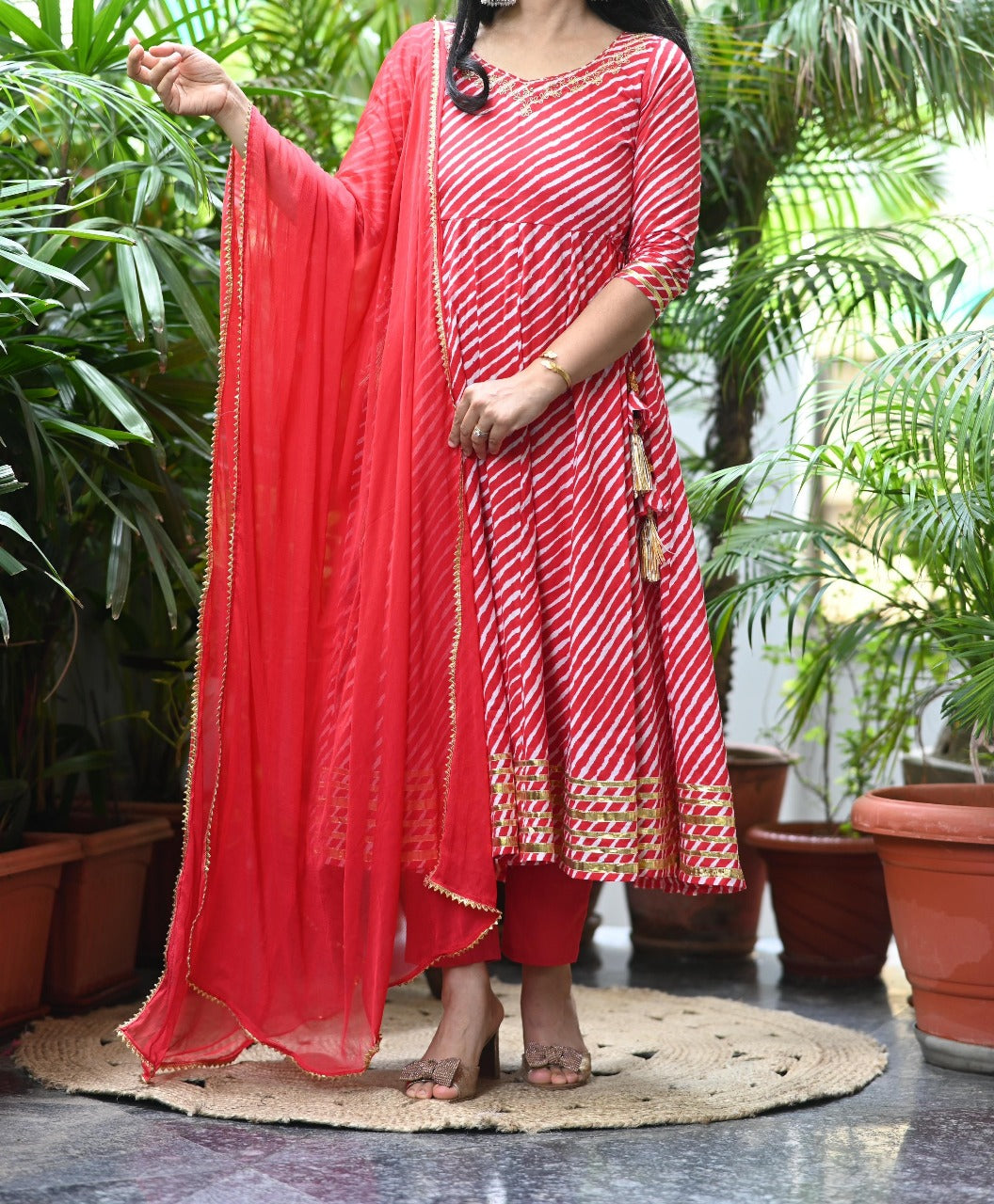 Celebrate tradition with this festive Anarkali suit.